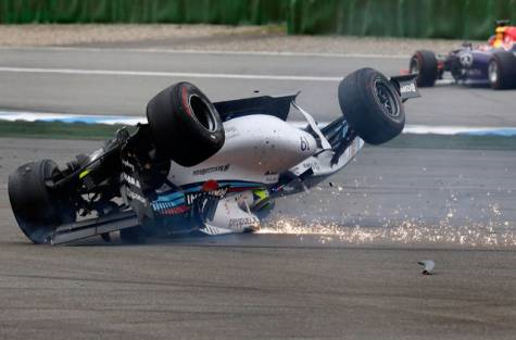 Felipe Massa is flipped upside down in the first turn during the 2014 German Grand Prix.