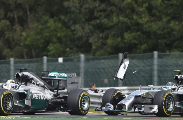 Nico Rosberg exchanges pleasantries with his Mercedes teammate Lewis Hamilton.
