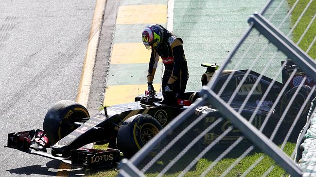 Pastor Maldonado leaves his Lotus by the roadside after a Lap One crash.