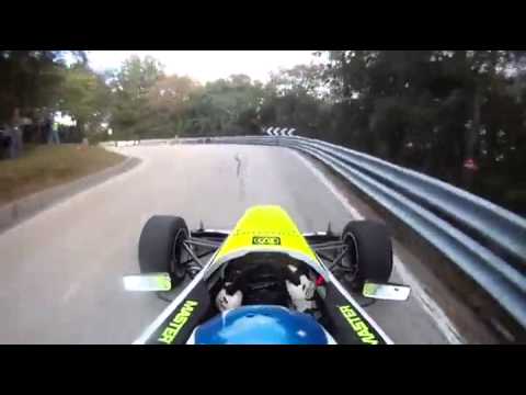 Formula One Car Speeds Up Mountain Road