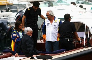 Bernie Ecclestone chattign with Flavio Briatore