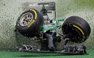 Kamui Kobayashi of Caterham crashes out on the first corner of the first lap.