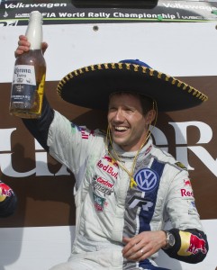 Sebastien Ogier celebrates properly afte winning the 2014 Rally Mexico.