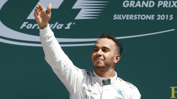 Lewis Hamilton salutes the crowd after winning the 2015 British Grand Prix [photo credit: Reuters]