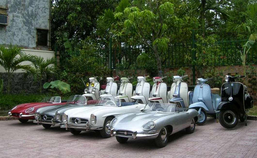 Some of Harrington's kit car fleet - and some scooters for perspective.
