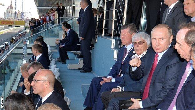 F1 chief crusty barnacle Bernie Ecclestone sitting next to his best pal, Russian nutball dictator, Vladimir Putin.