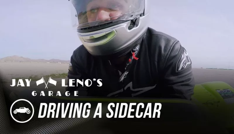 Jay Leno Drives A Sidecar Out Of His Garage